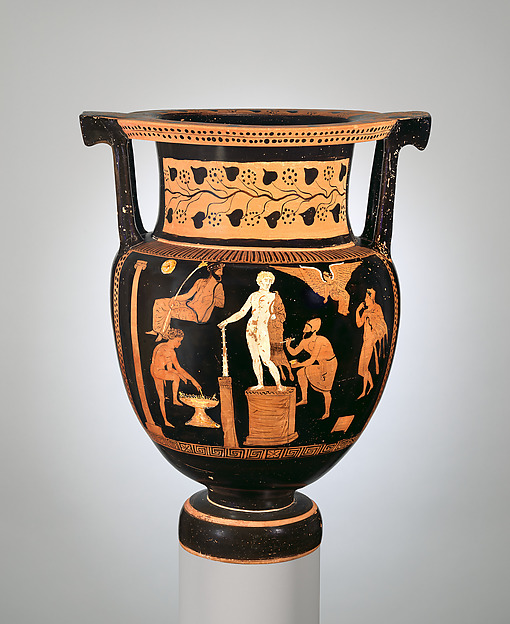 A Greek vase showing an artist painting a statue of Herakles